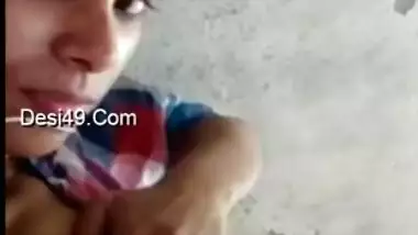 Attractive Desi girl lies on the bed and even flashes her XXX boobs